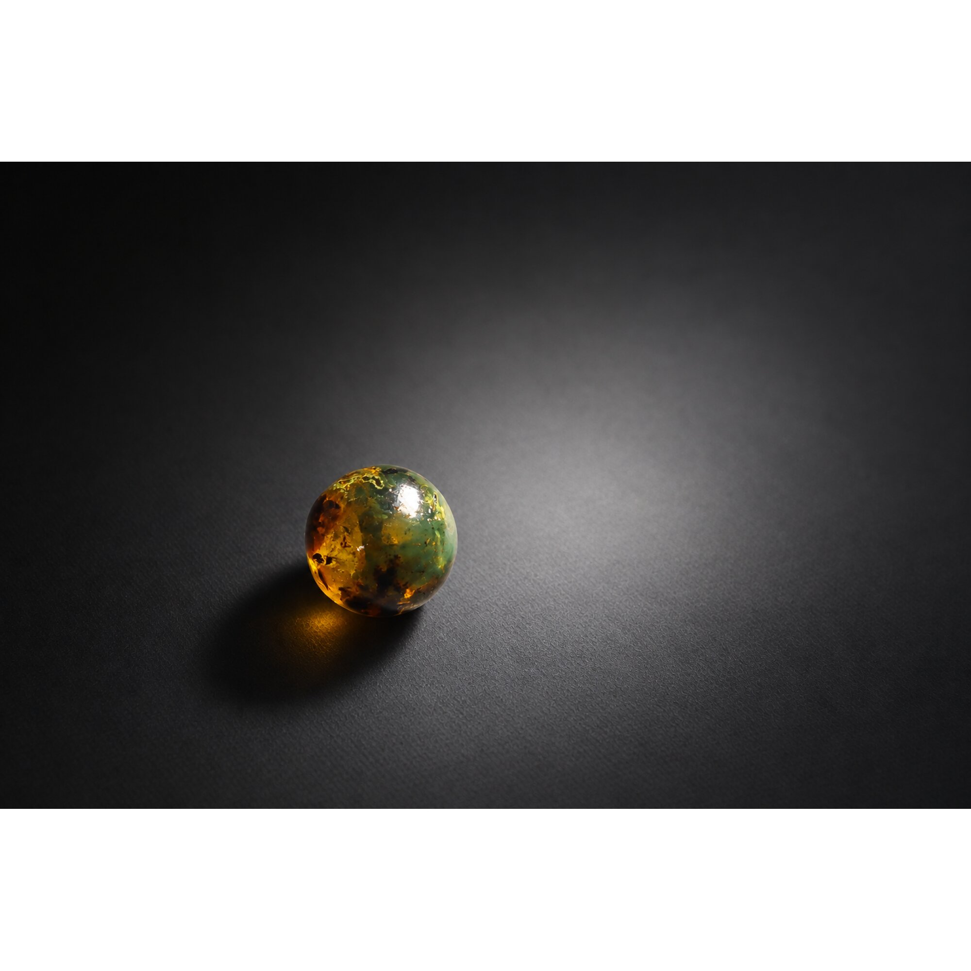 Earth mined deep green Dominican amber sphere/ball 16.7mm – photo 10