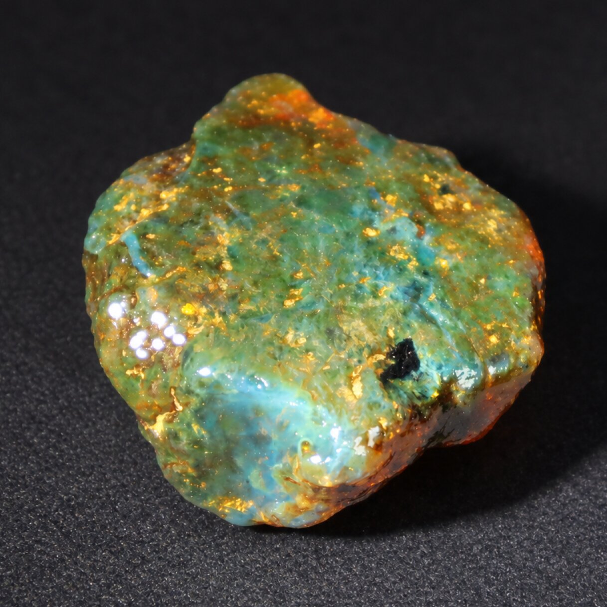 Real green blue rough specimen Dominican amber 42mm