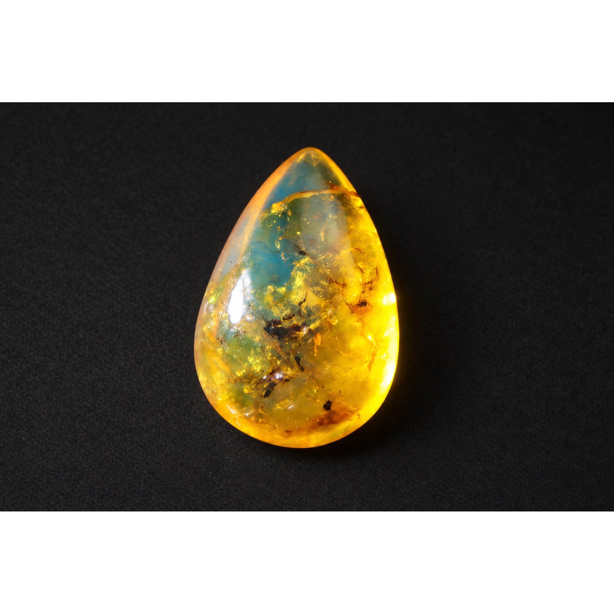 Pure natural orange blue polished Dominican amber 2.1g – photo 3
