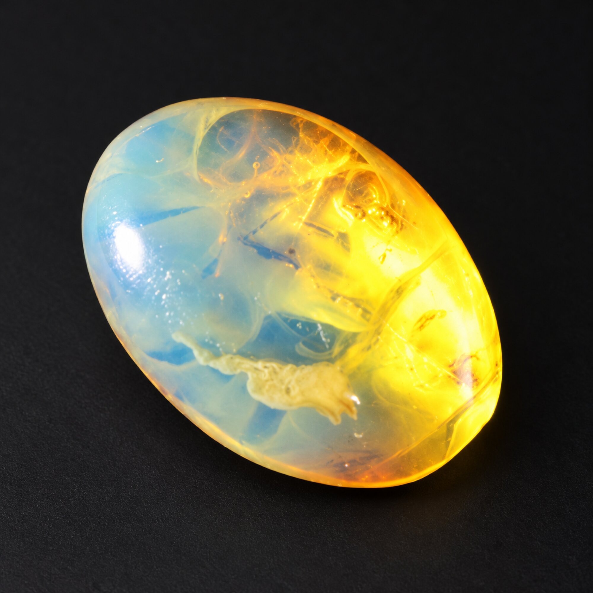 Untreated sky blue Dominican amber cabochon – photo 4