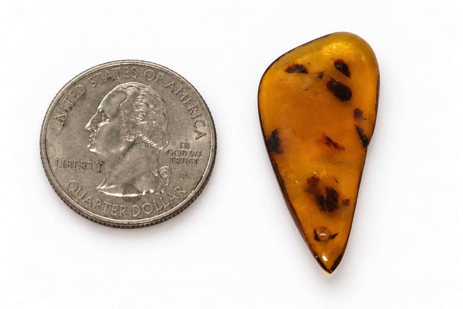 Genuine orange green polished Dominican amber