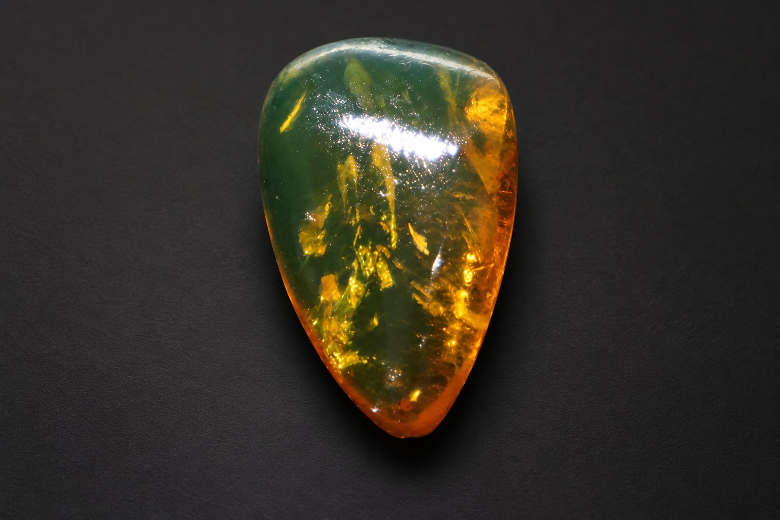 Genuine orange green polished Dominican amber – photo 2